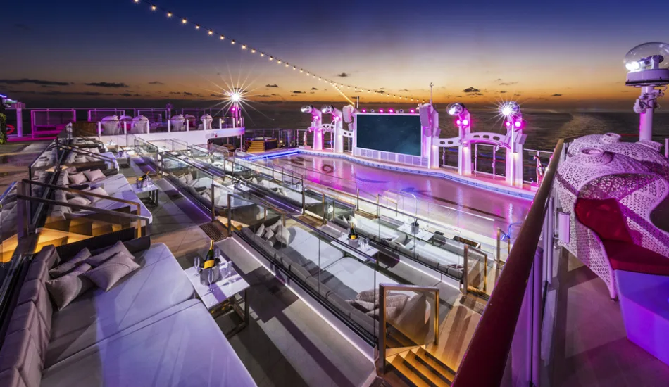 Zouk Beach Club on Genting Dream with outdoor LED screen, terraced seating and shallow pool