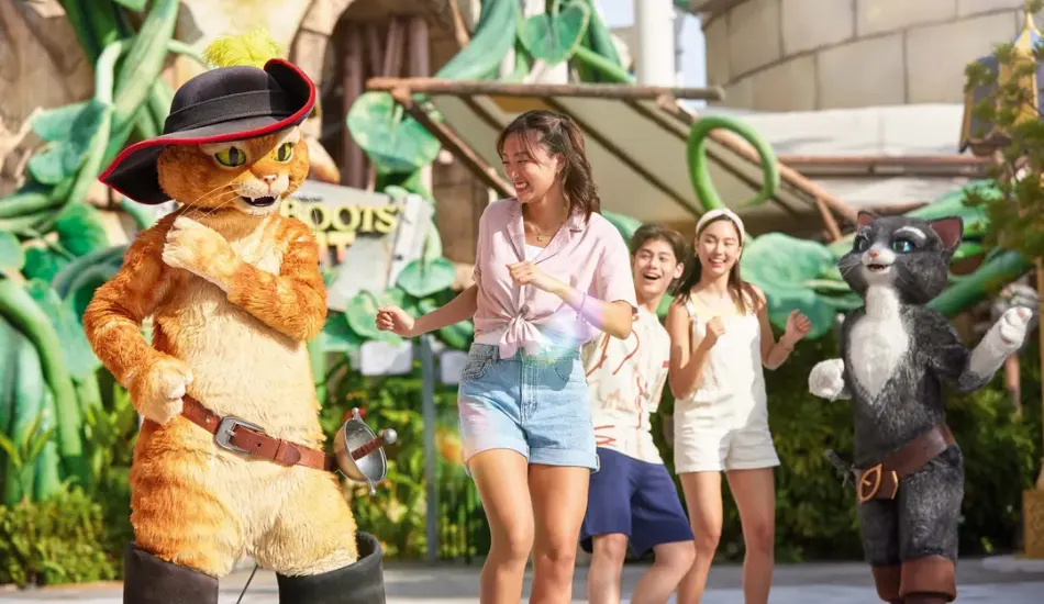 Visitors enjoying a Puss in Boots character experience at Universal Studios Singapore