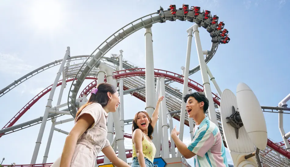 Visitors enjoying a roller coaster ride at Universal Studios Singapore