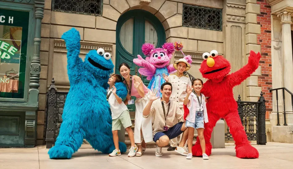 Family meeting Sesame Street characters at Universal Studios Singapore
