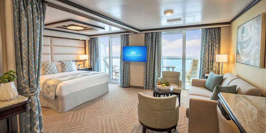 Discovery Princess Sky Suite with ocean view, luxury interiors and seating area