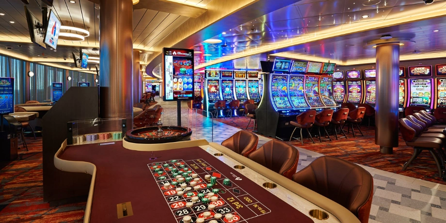 Casino slot machines and gaming tables onboard Genting Dream