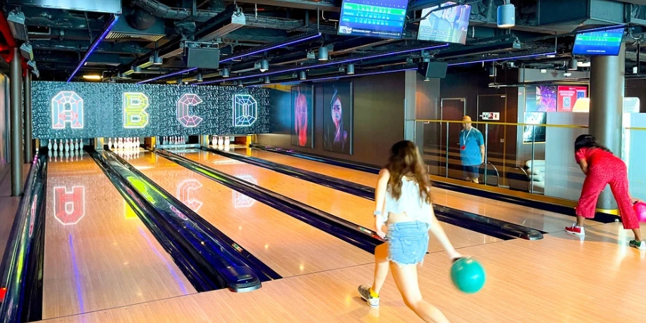 Glow bowling alley onboard Genting Dream for family and teens