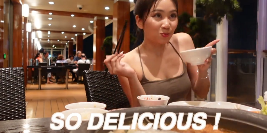 Guest enjoying dinner at Genting Dream cruise open-air restaurant