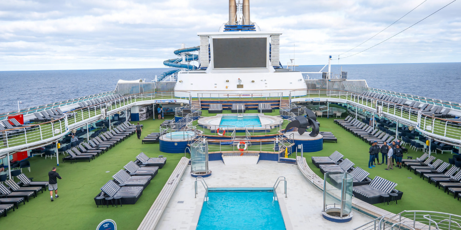 Top view of swimming pools and deck lounge on Star Voyager Cruise